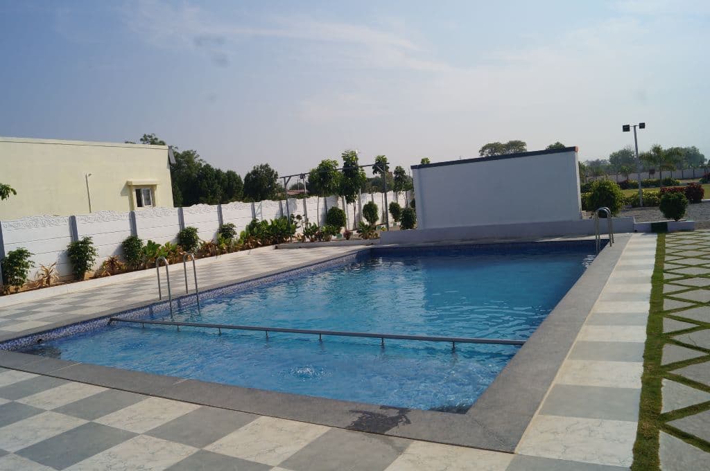 Private swimming pool at Brindha Villa Farmhouse, Amdapur, Moinabad