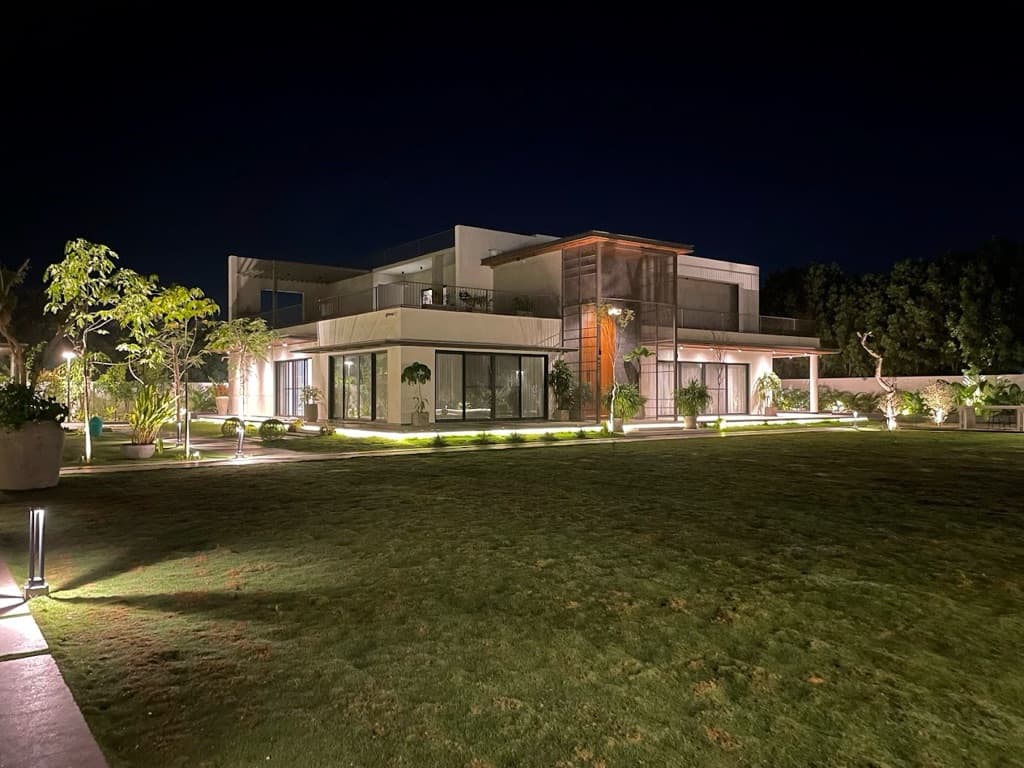The farmhouse at night at Mellon Villa, Moinabad