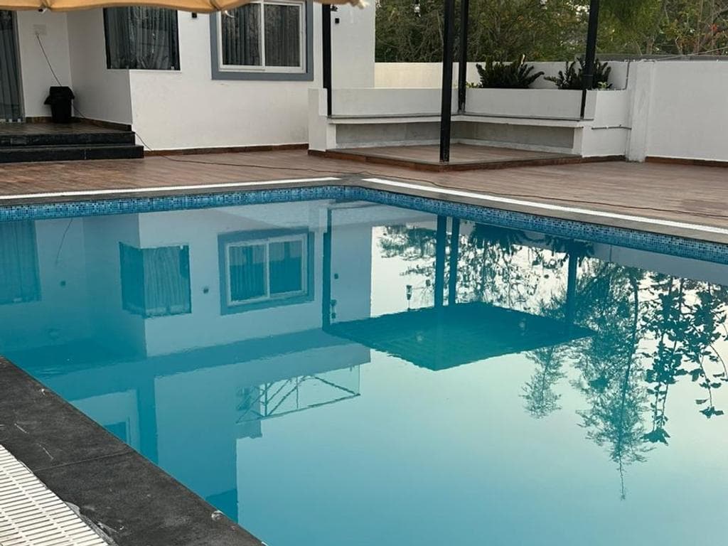 Private swimming pool at NRM Orchard City, Surangal, Moinabad