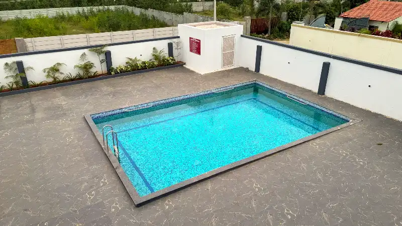 Private swimming pool at Happy Shire Farmhouse, Yethbarpally, Moinabad